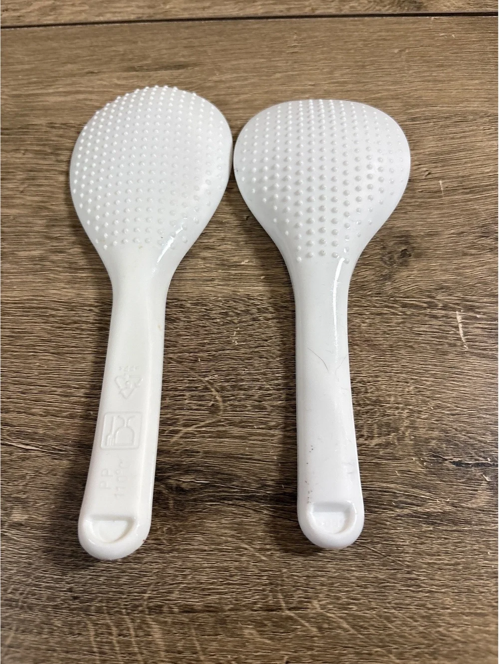 Set of 2 White Plastic Rice Spoons with Textured Heads